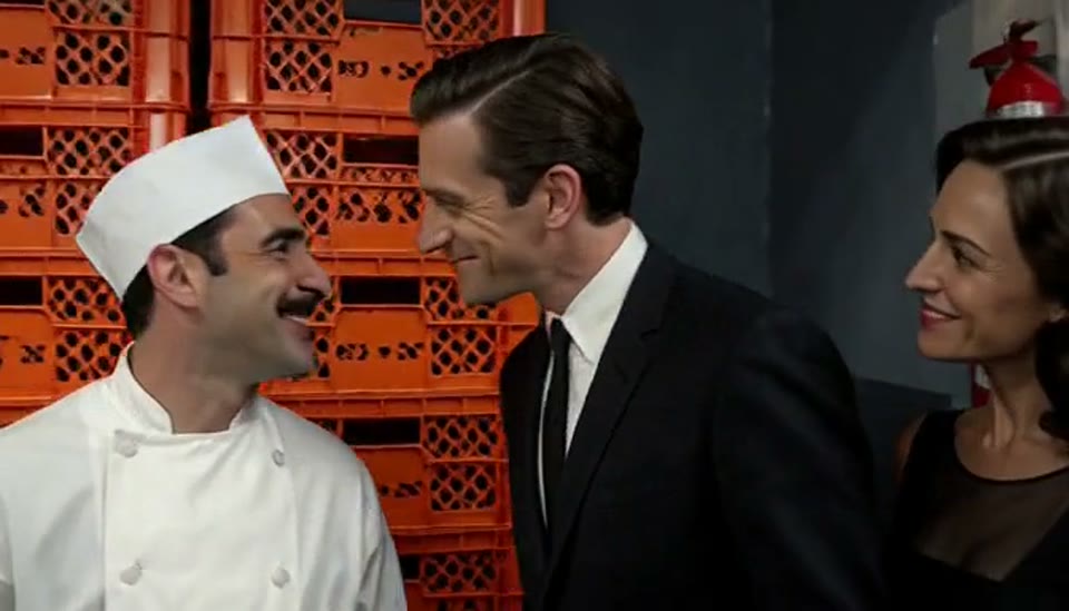 The generated video at 10.5 seconds, with the camera ahead of the man as he greets the cook.